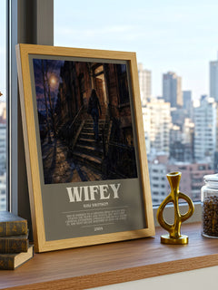 Wifey Bookish Wall Art by Kiki Swinson – framed print on a city-view windowsill