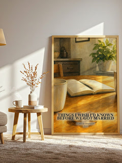 Things I wish I'd known before we got married watercolour print in frame leaning in hallway – non fiction wall art