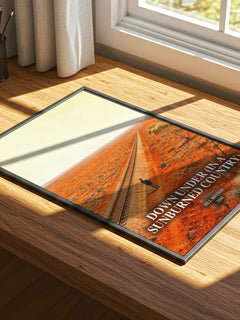 Down Under (In a Sunburned Country) watercolour book poster framed on wall – non fiction wall art