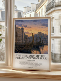 The History of the Peloponnesian War bookish print in frame leaning in hallway – non fiction wall art