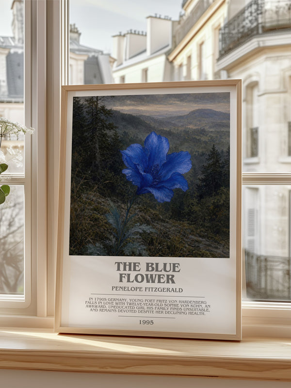 The Blue Flower Bookish Wall Art by Penelope Fitzgerald – framed print by a bright window