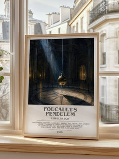 Foucault's Pendulum Bookish Wall Art by Umberto Eco – framed print by a bright window