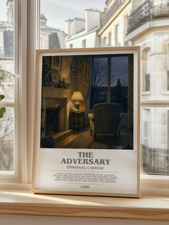 The Adversary Bookish Wall Art by Emmanuel Carrère – framed print by a bright window