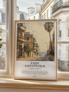 Past Continuous Bookish Wall Art by Yaakov Shabtai – framed print by a bright window