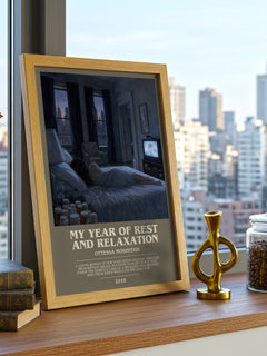 My Year of Rest and Relaxation Bookish Wall Art by Ottessa Moshfegh – framed print on a city-view windowsill