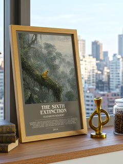 The Sixth Extinction Bookish Wall Art by Elizabeth Kolbert – framed print on a city-view windowsill