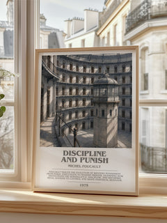 Discipline and Punish Bookish Wall Art by Michel Foucault – framed print by a bright window