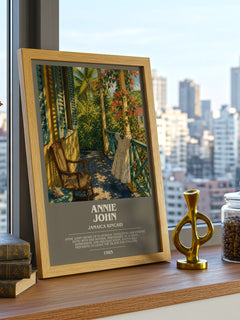 Annie John Bookish Wall Art by Jamaica Kincaid – framed print on a city-view windowsill