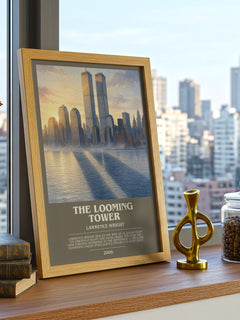 The Looming Tower Bookish Wall Art by Lawrence Wright – framed print on a city-view windowsill