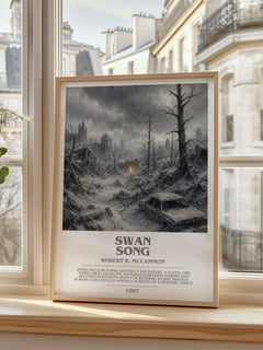 Swan Song Bookish Wall Art by Robert R. McCammon – framed print by a bright window