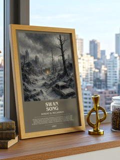 Swan Song Bookish Wall Art by Robert R. McCammon – framed print on a city-view windowsill