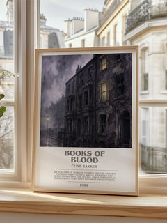 Books of Blood Bookish Wall Art by Clive Barker – framed print by a bright window