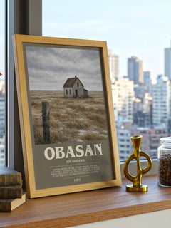 Obasan Bookish Wall Art by Joy Kogawa – framed print on a city-view windowsill