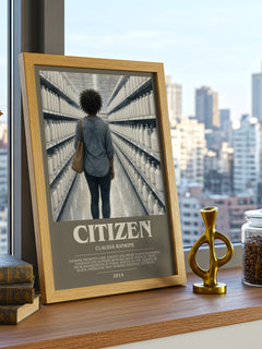 Citizen Bookish Wall Art by Claudia Rankine – framed print on a city-view windowsill