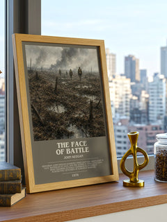 The Face of Battle Bookish Wall Art by John Keegan – framed print on a city-view windowsill