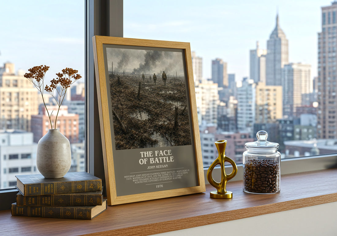 The Face of Battle Bookish Wall Art by John Keegan – framed print on a city-view windowsill