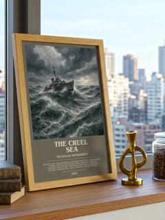 The Cruel Sea Bookish Wall Art by Nicholas Monsarrat – framed print on a city-view windowsill
