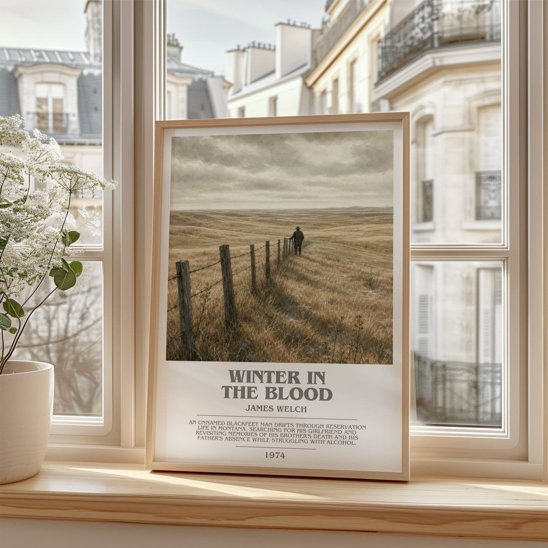 Winter In The Blood Bookish Wall Art by James Welch – framed print by a bright window