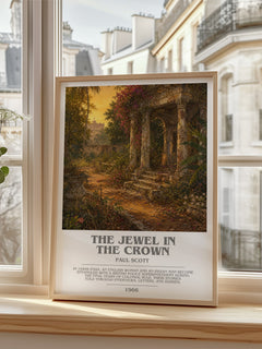 The Jewel In The Crown Bookish Wall Art by Paul Scott – framed print by a bright window