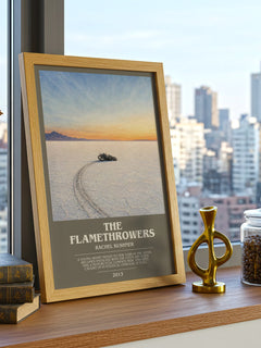 The Flamethrowers Bookish Wall Art by Rachel Kushner – framed print on a city-view windowsill
