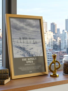 The Kindly Ones Bookish Wall Art by Jonathan Littell – framed print on a city-view windowsill