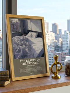 The Beauty Of The Husband Bookish Wall Art by Anne Carson – framed print on a city-view windowsill