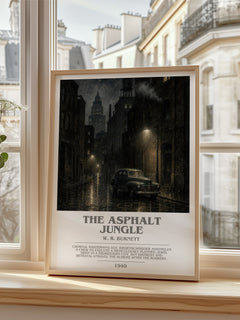 The Asphalt Jungle Bookish Wall Art by W. R. Burnett – framed print by a bright window