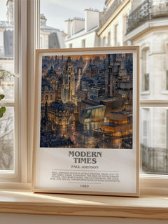 Modern Times Bookish Wall Art by Paul Johnson – framed print by a bright window