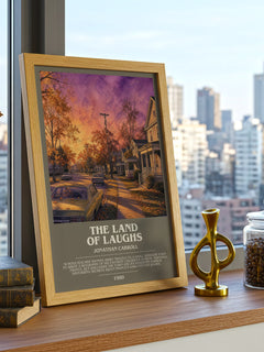 The Land Of Laughs Bookish Wall Art by Jonathan Carroll – framed print on a city-view windowsill