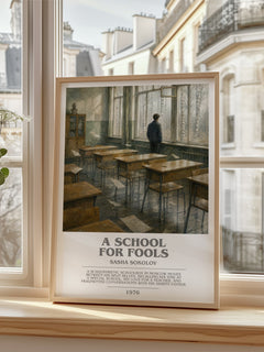 A School For Fools Bookish Wall Art by Sasha Sokolov – framed print by a bright window