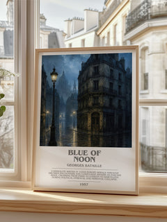 Blue of Noon Bookish Wall Art by Georges Bataille – framed print by a bright window