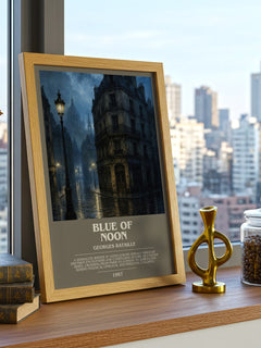Blue of Noon Bookish Wall Art by Georges Bataille – framed print on a city-view windowsill