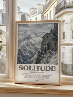 Solitude Bookish Wall Art by Caterina Albert – framed print by a bright window