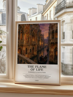 The Flame Of Life Bookish Wall Art by Gabriele D'Annunzio – framed print by a bright window