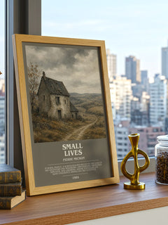 Small Lives Bookish Wall Art by Pierre Michon – framed print on a city-view windowsill