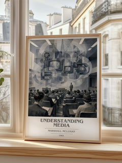 Understanding Media book cover print in frame leaning in hallway – non fiction wall art