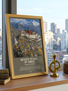 Seven Years in Tibet Bookish Wall Art by Heinrich Harrer – framed print on a city-view windowsill
