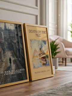 The Book of Laughter and Forgetting watercolour print framed by window – literary home decor