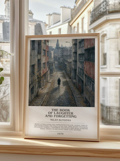The Book of Laughter and Forgetting bookish print in frame leaning in hallway – literary fiction wall art