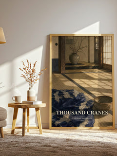 Thousand Cranes watercolour print in frame leaning in hallway – literary fiction wall art