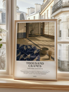 Thousand Cranes bookish print in frame leaning in hallway – literary fiction wall art