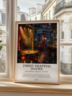 Three Trapped Tigers Bookish Wall Art by Guillermo Cabrera Infante – framed print by a bright window