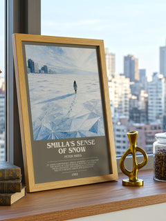 Smilla's Sense of Snow Bookish Wall Art by Peter Høeg – framed print on a city-view windowsill