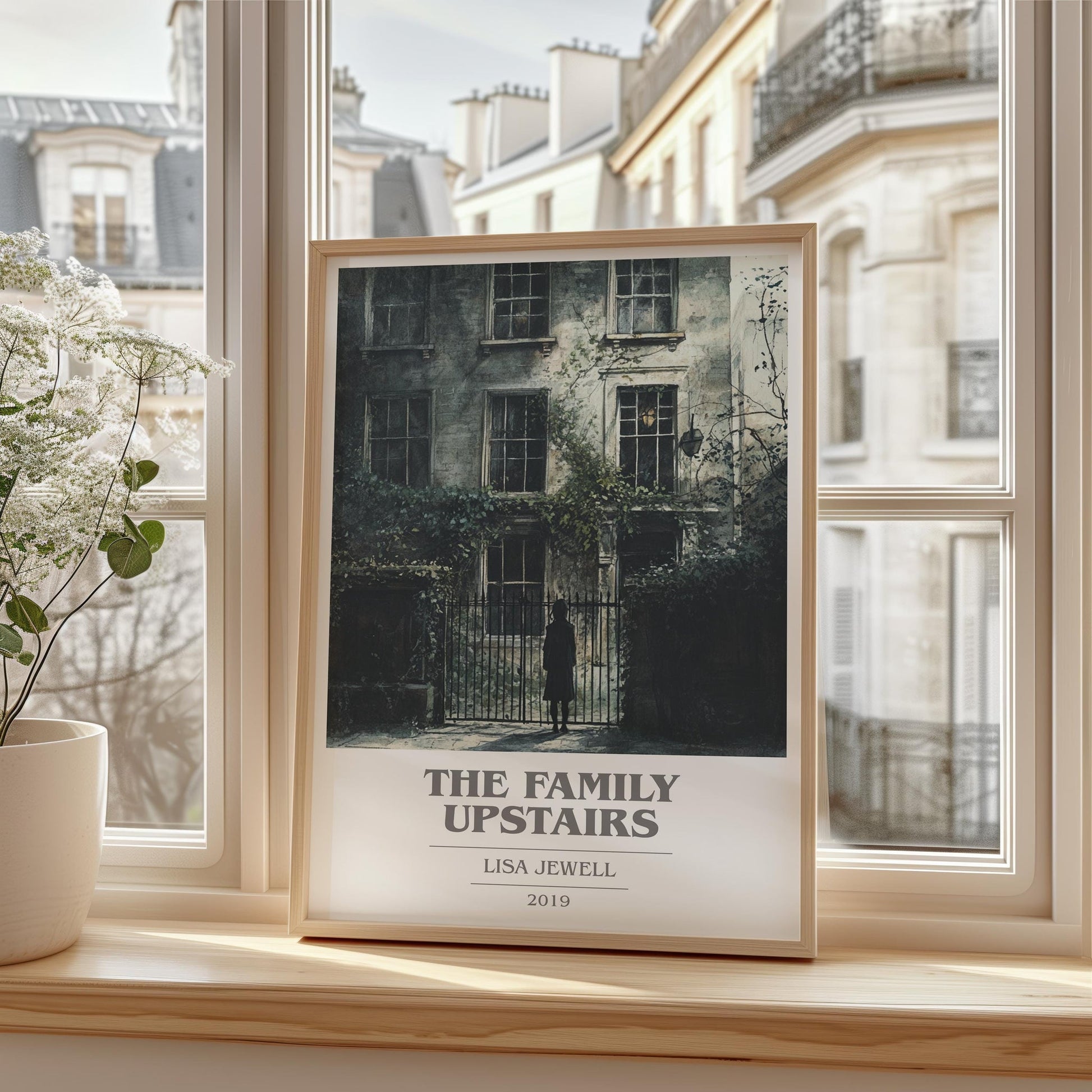 The Family Upstairs book cover print framed by window – literary home decor