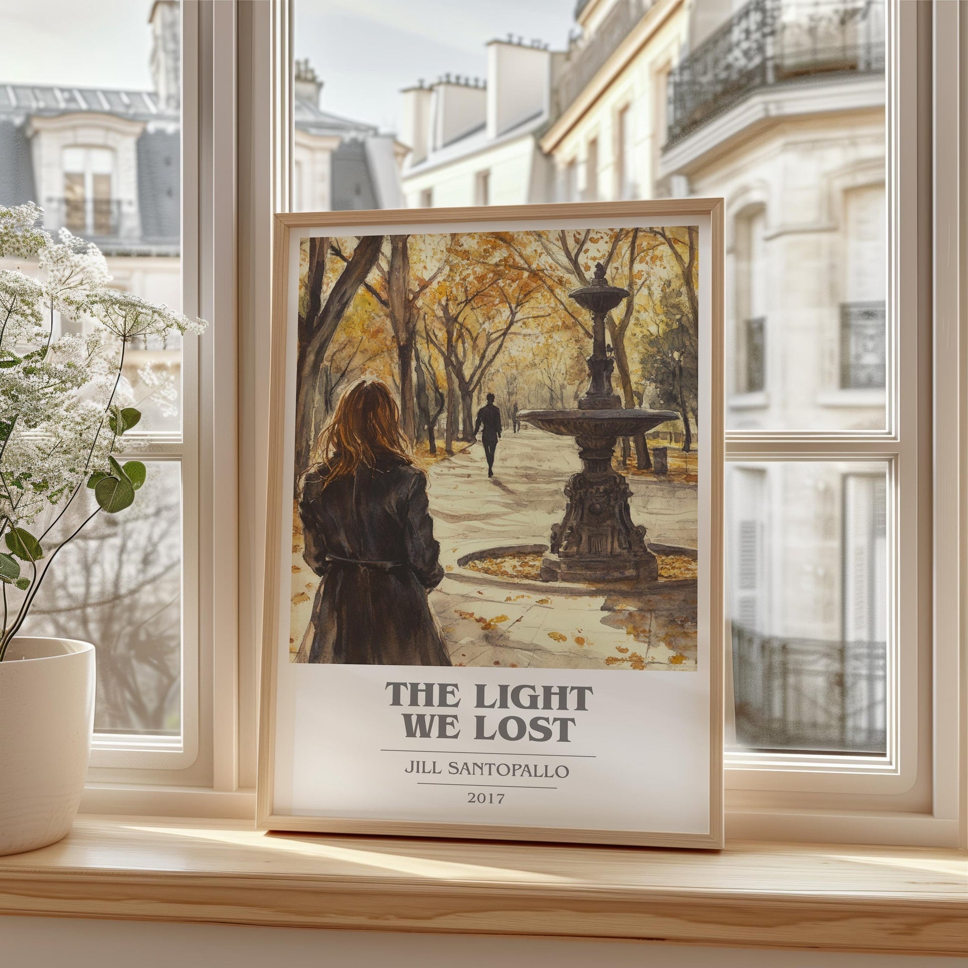 The Light We Lost book cover print framed by window – literary home decor