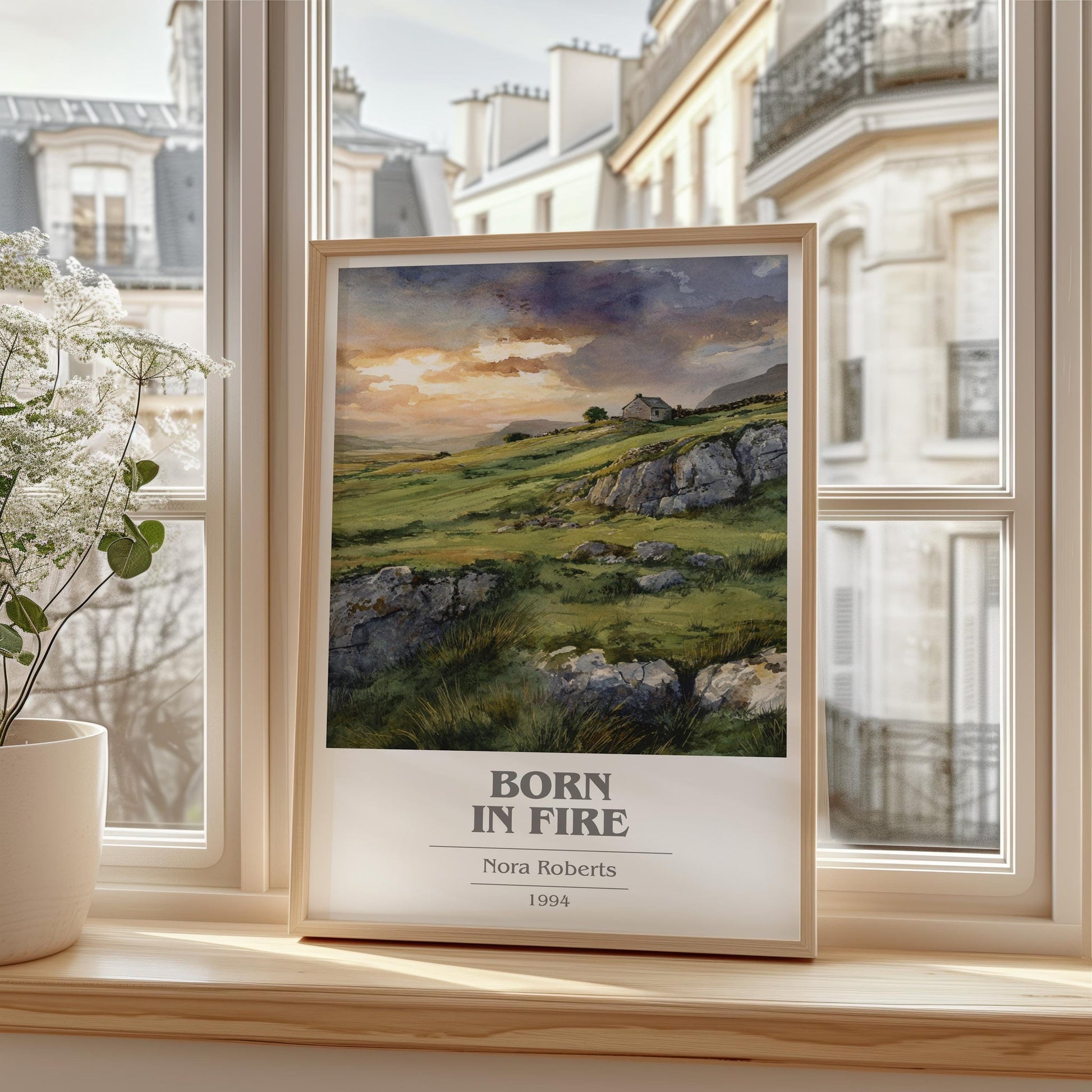 Born in Fire book cover print framed by window – literary home decor