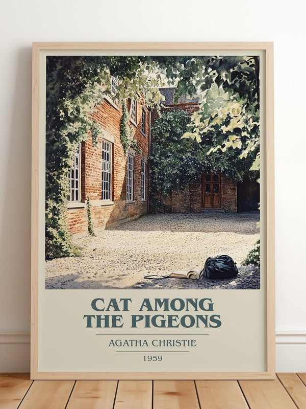Cat Among the Pigeons book cover print in frame leaning in hallway – mystery wall art
