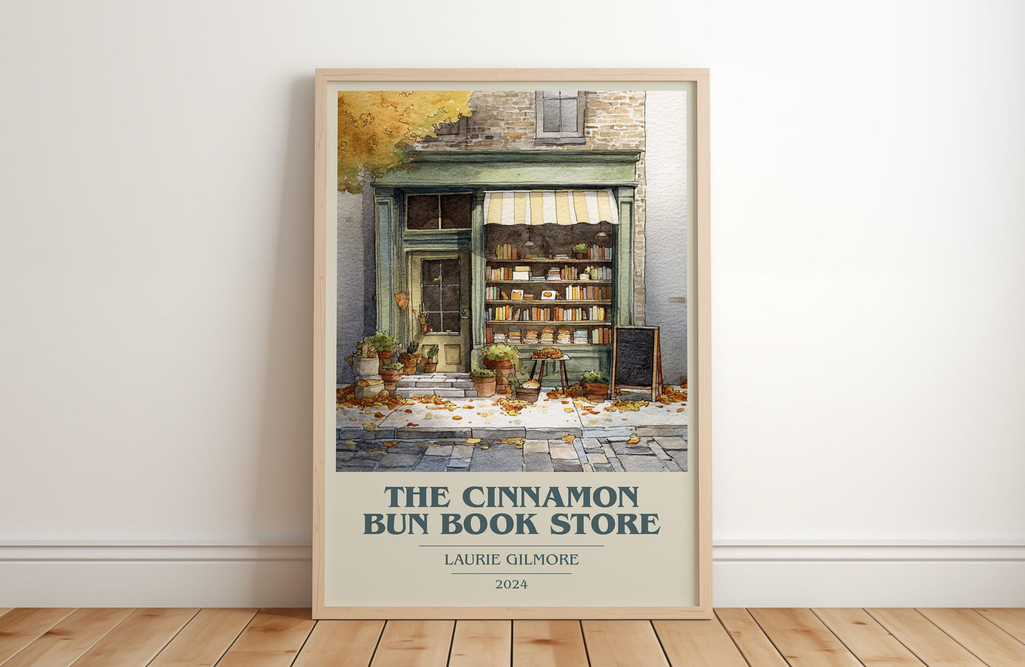 The Cinnamon Bun Book Store book cover print in frame leaning in hallway – romance wall art