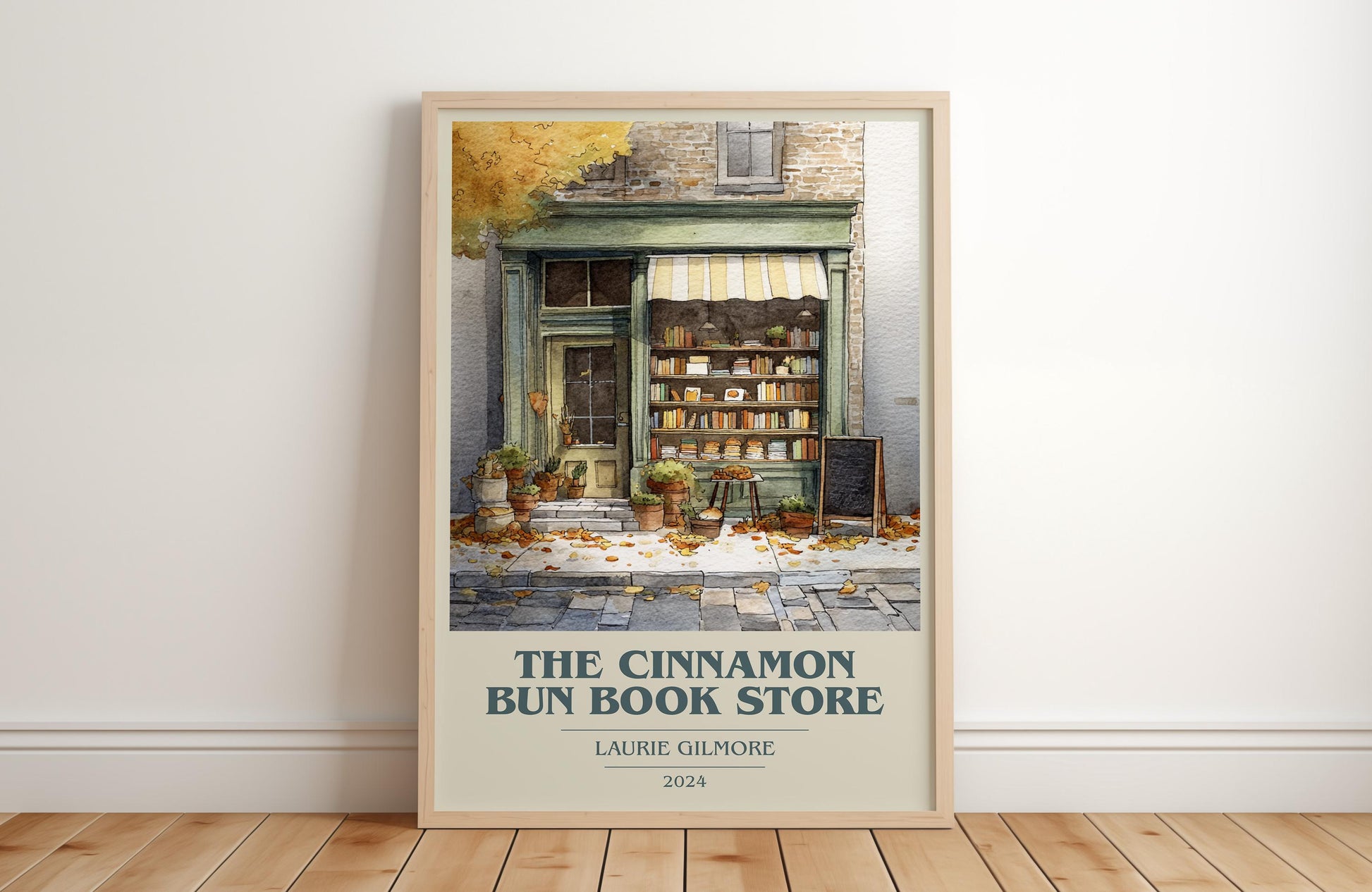 The Cinnamon Bun Book Store book cover print in frame leaning in hallway – romance wall art